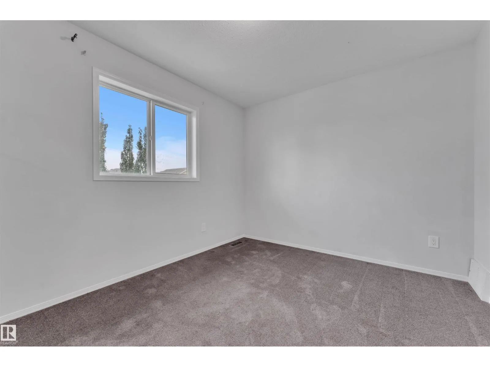 3323 26 AV NW