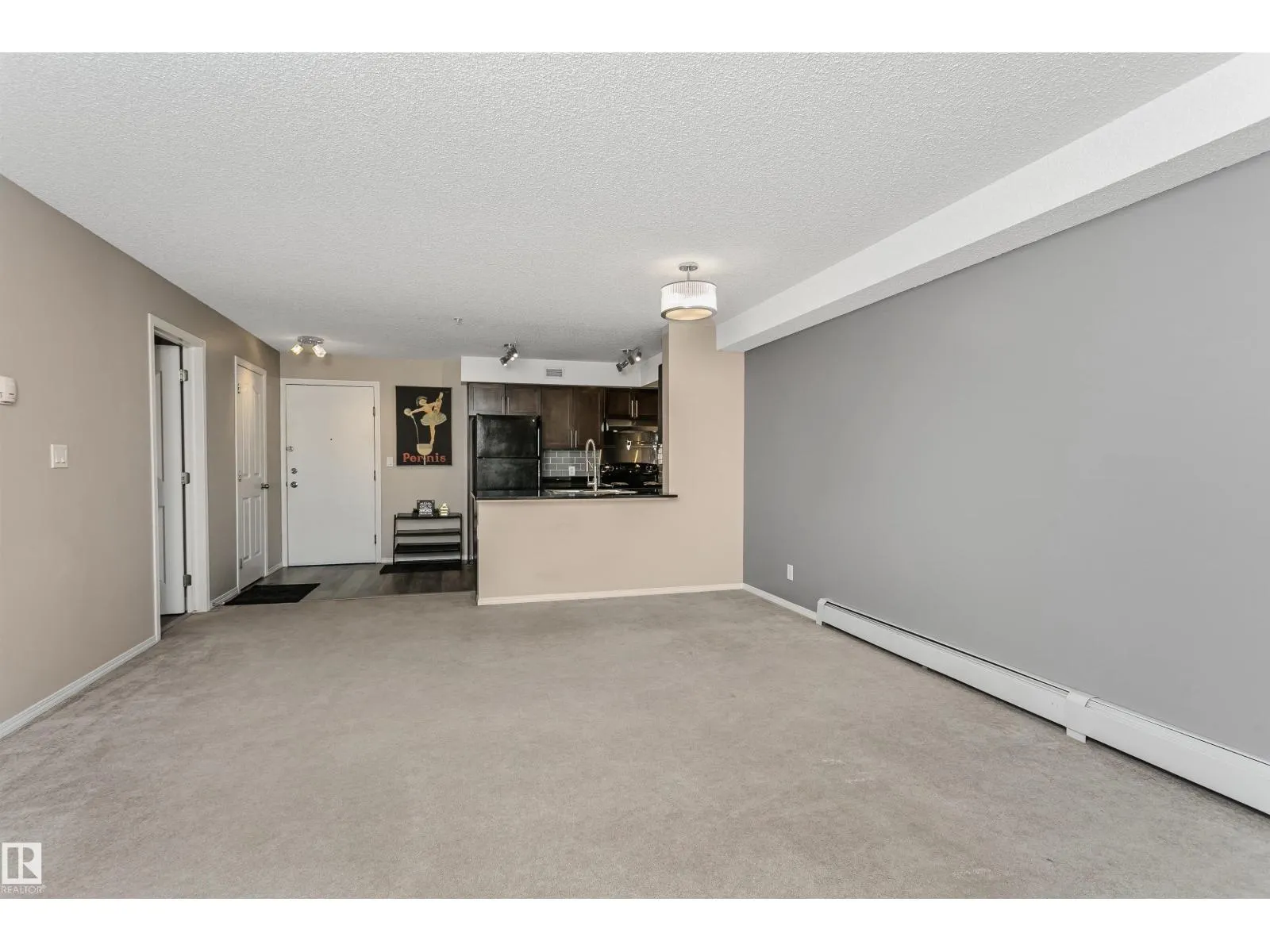 #303 11820 22 AV SW