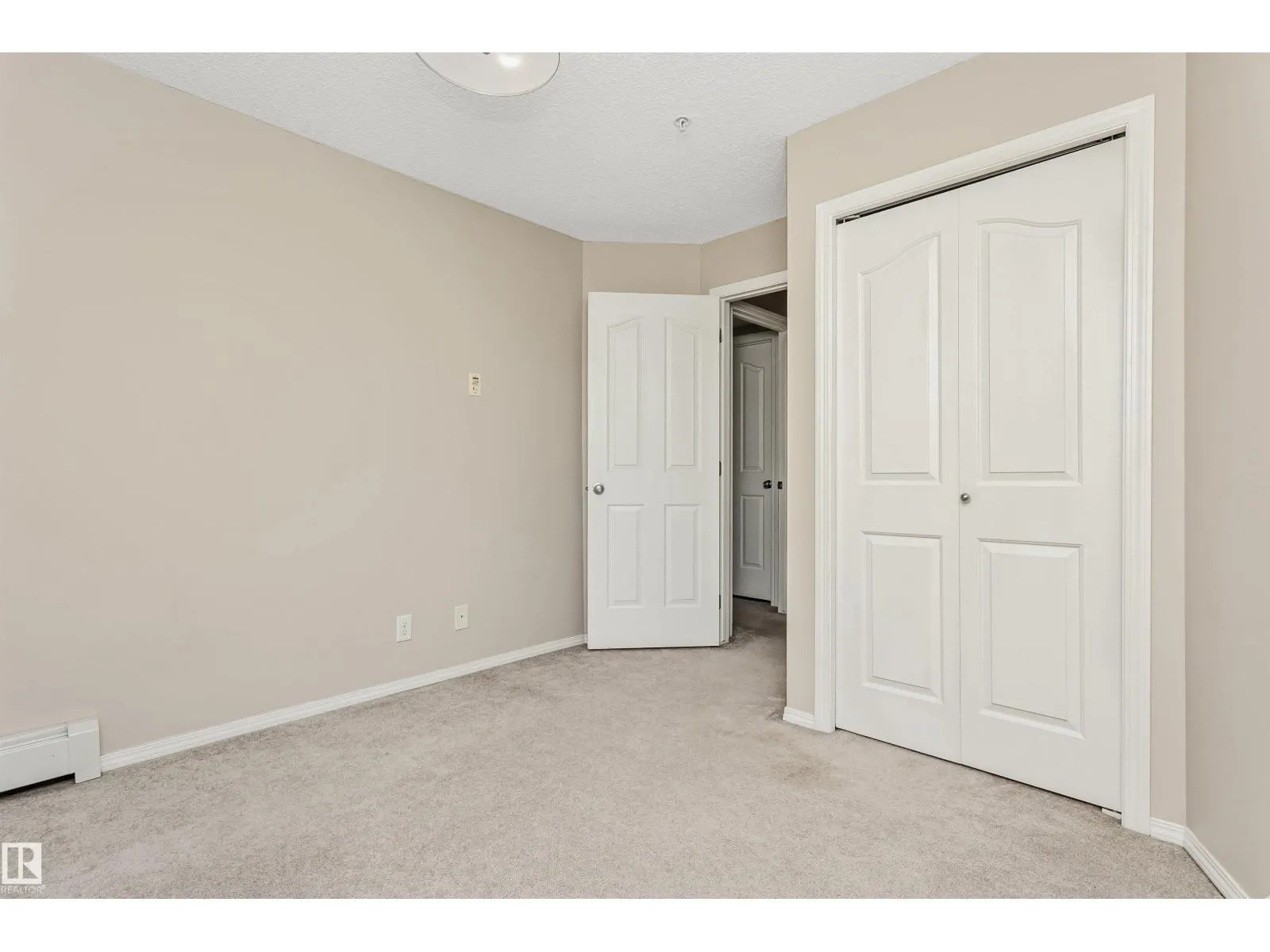 #303 11820 22 AV SW