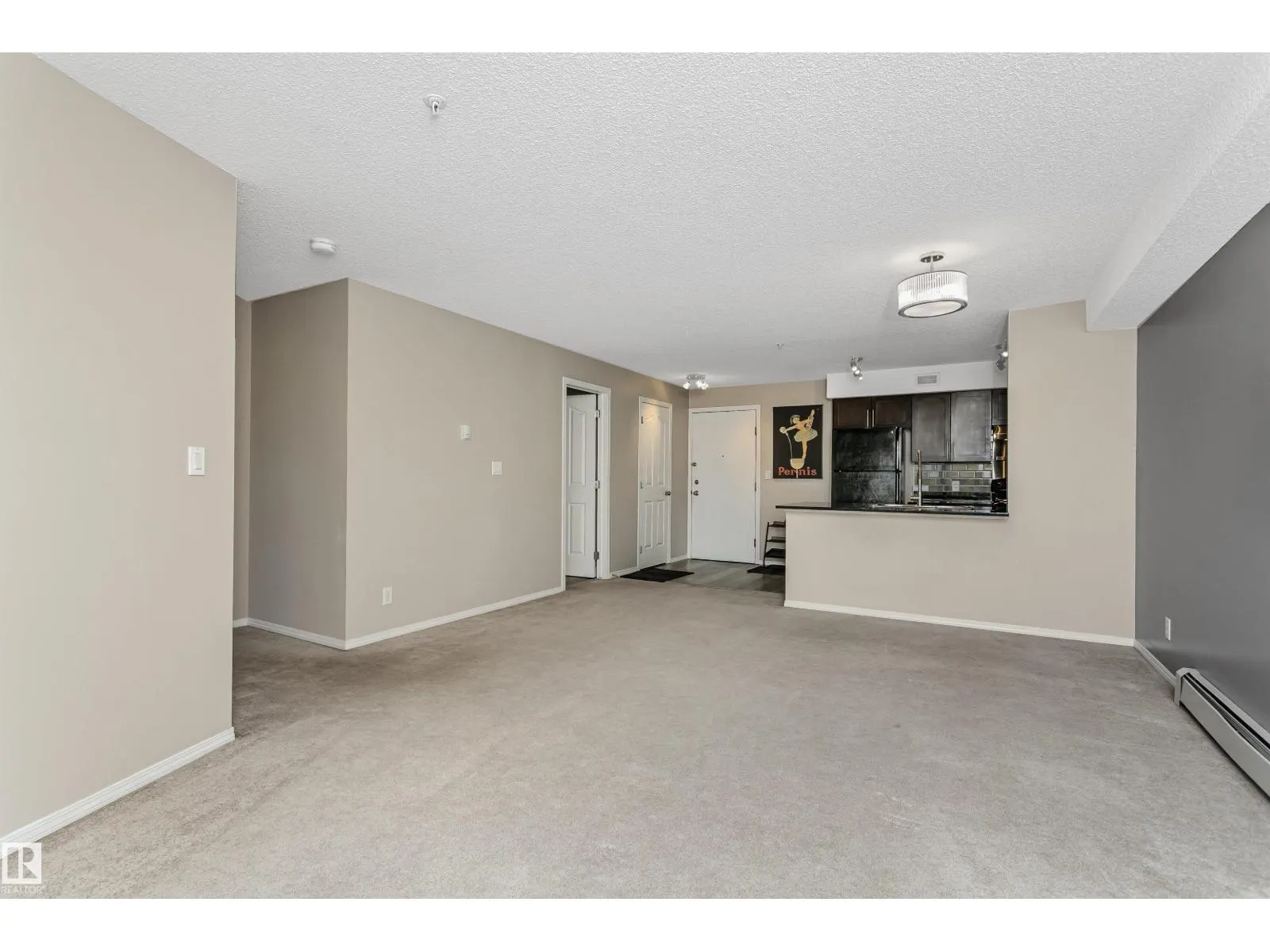 #303 11820 22 AV SW