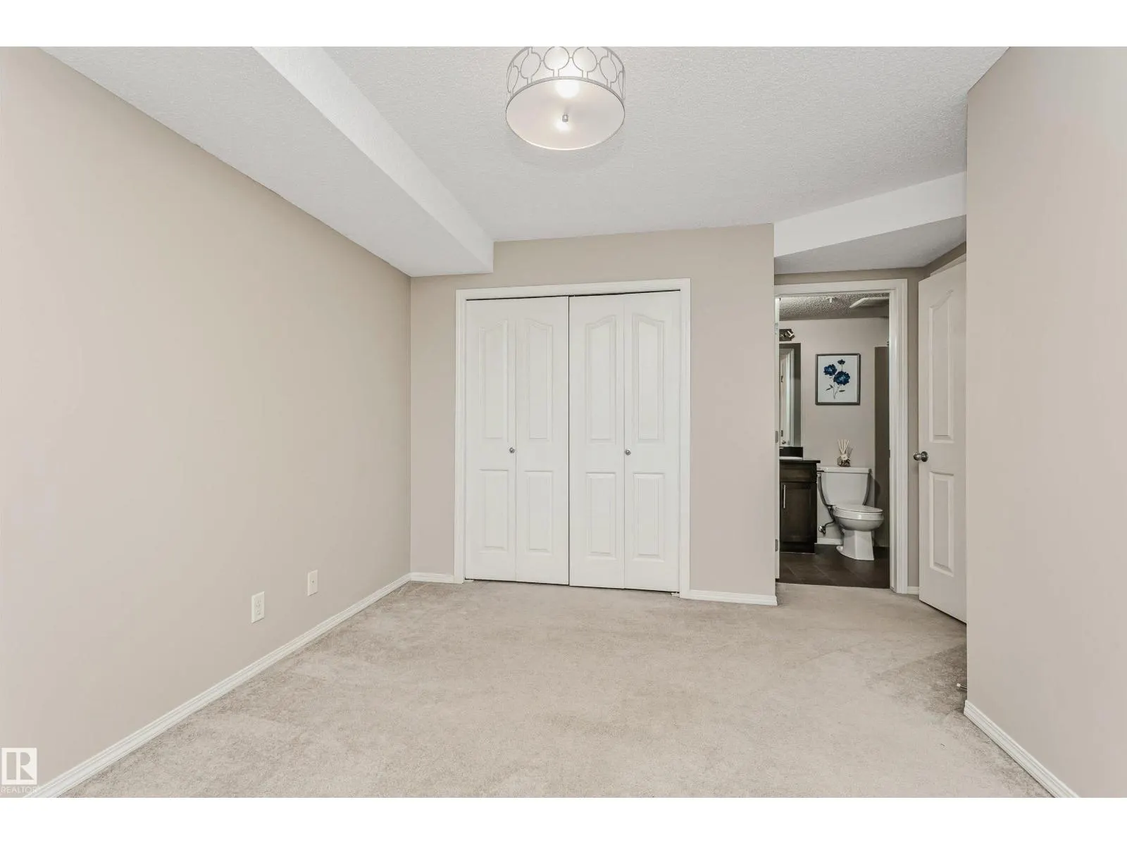 #303 11820 22 AV SW