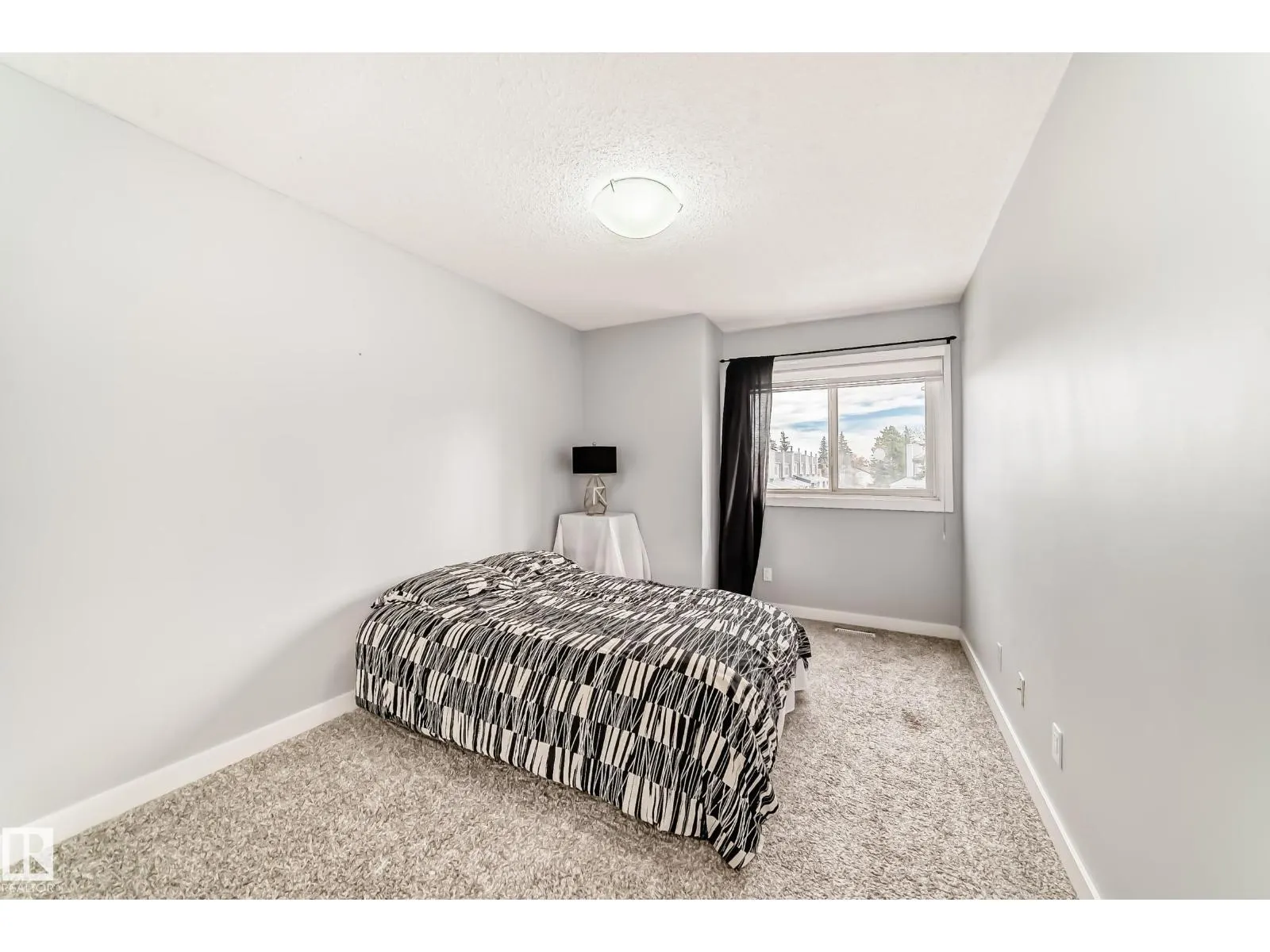 #310 10404 24 AV NW