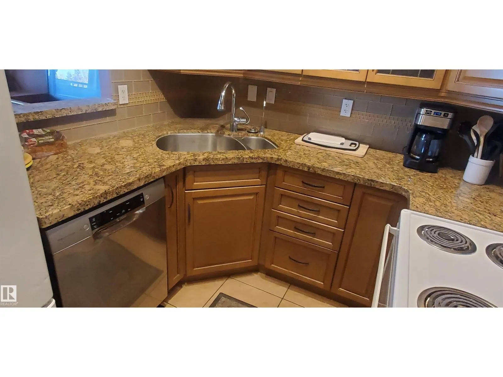 #415 5520 RIVERBEND RD NW