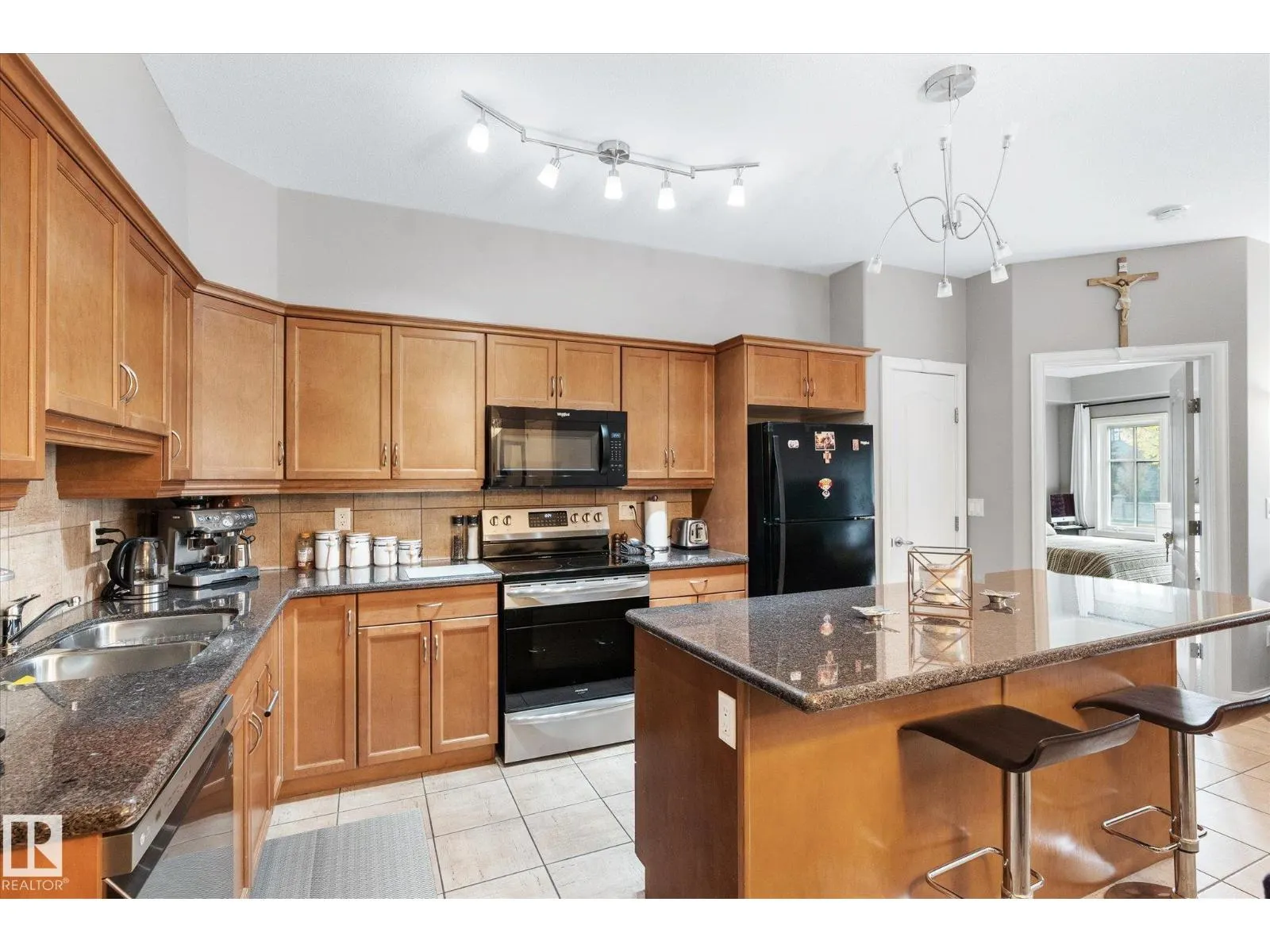 #213 1406 HODGSON WY NW