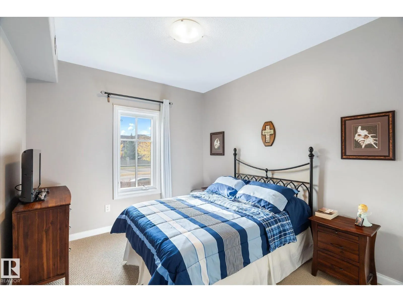 #213 1406 HODGSON WY NW