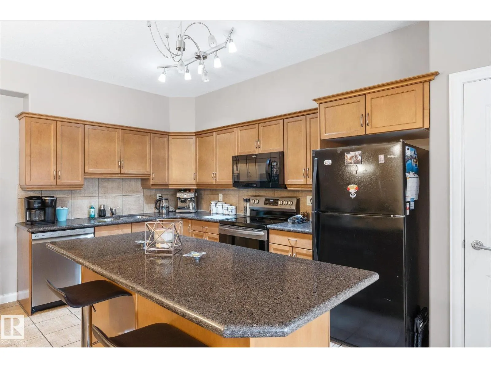 #213 1406 HODGSON WY NW