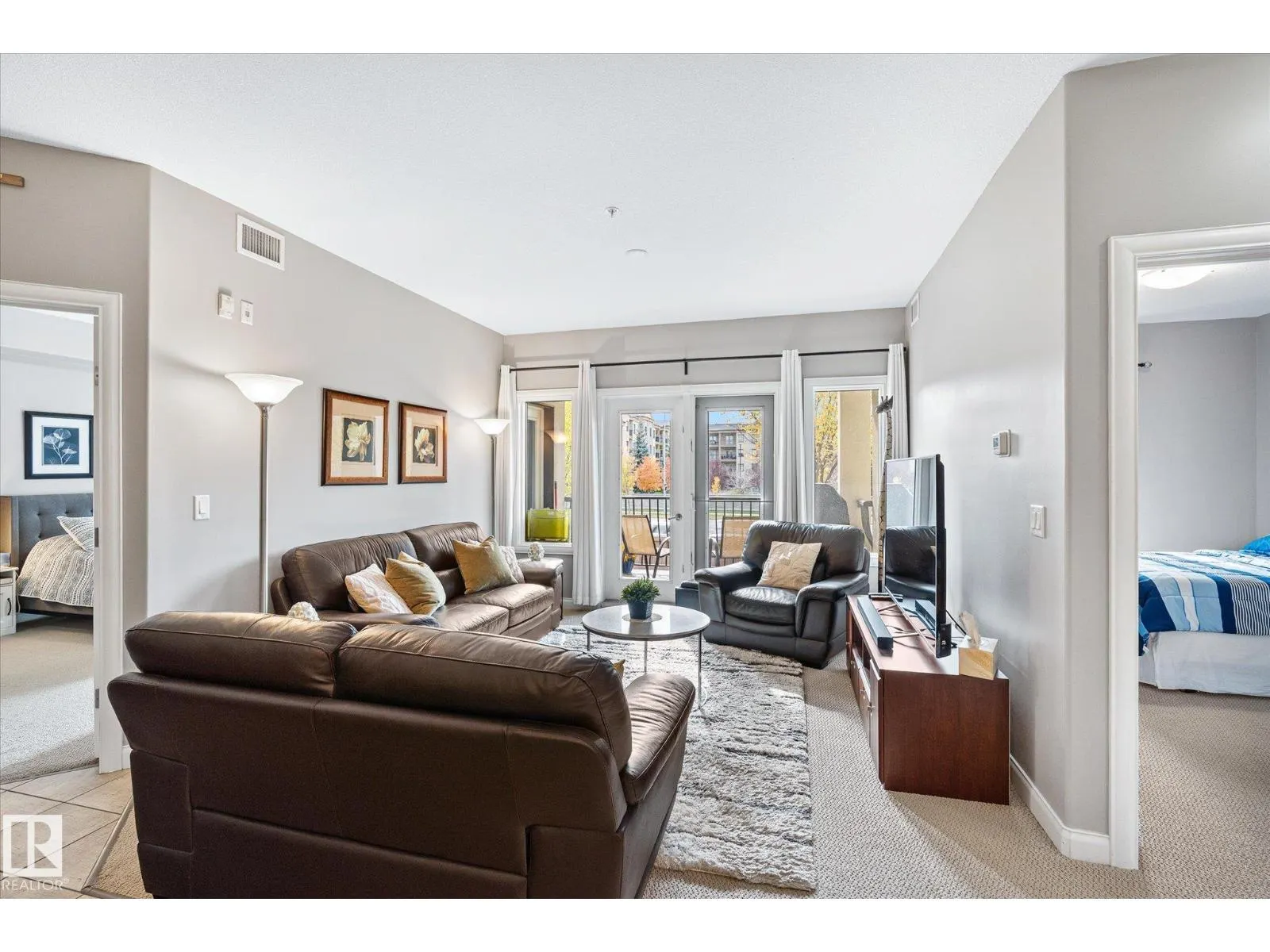 #213 1406 HODGSON WY NW