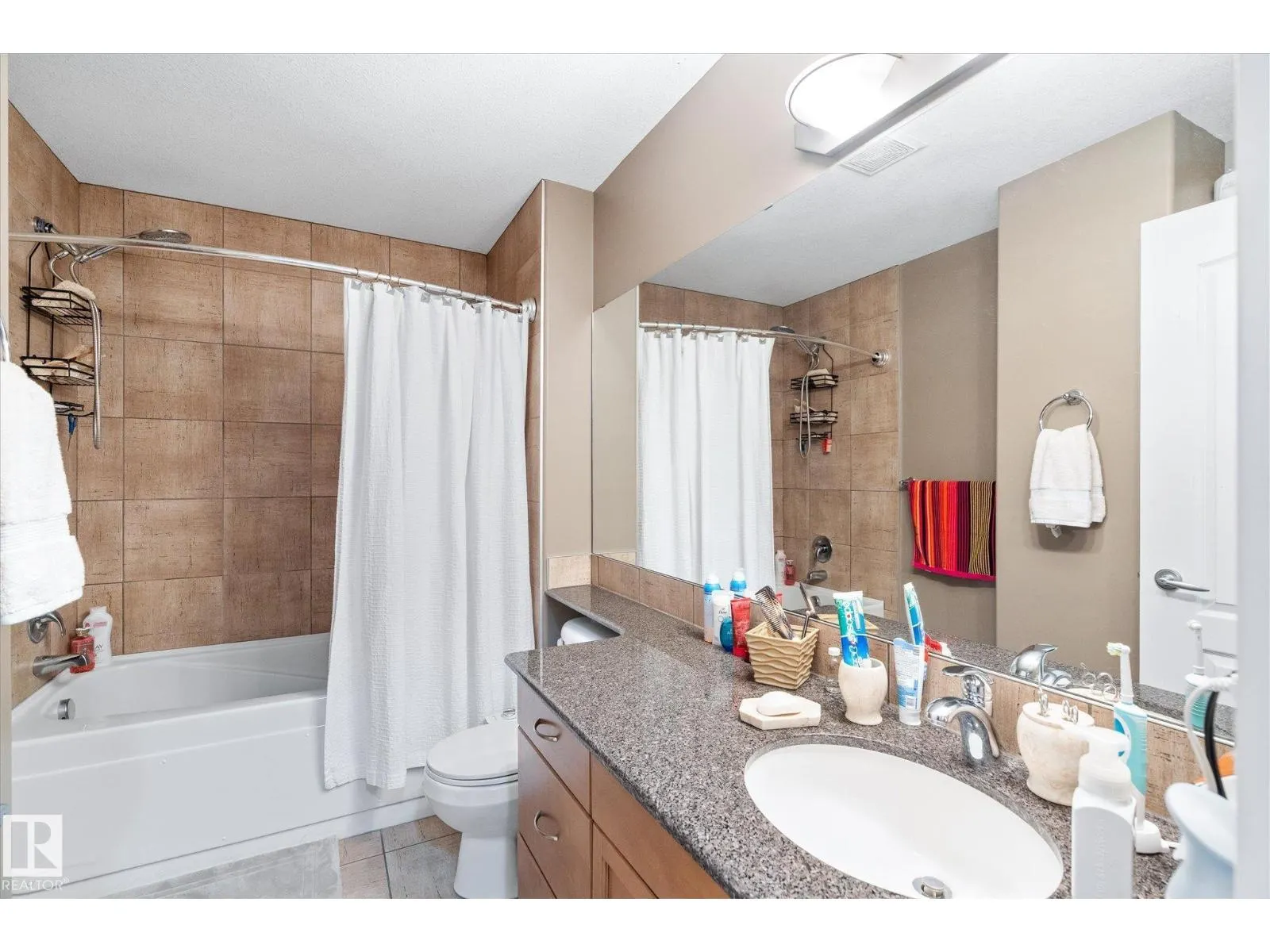 #213 1406 HODGSON WY NW