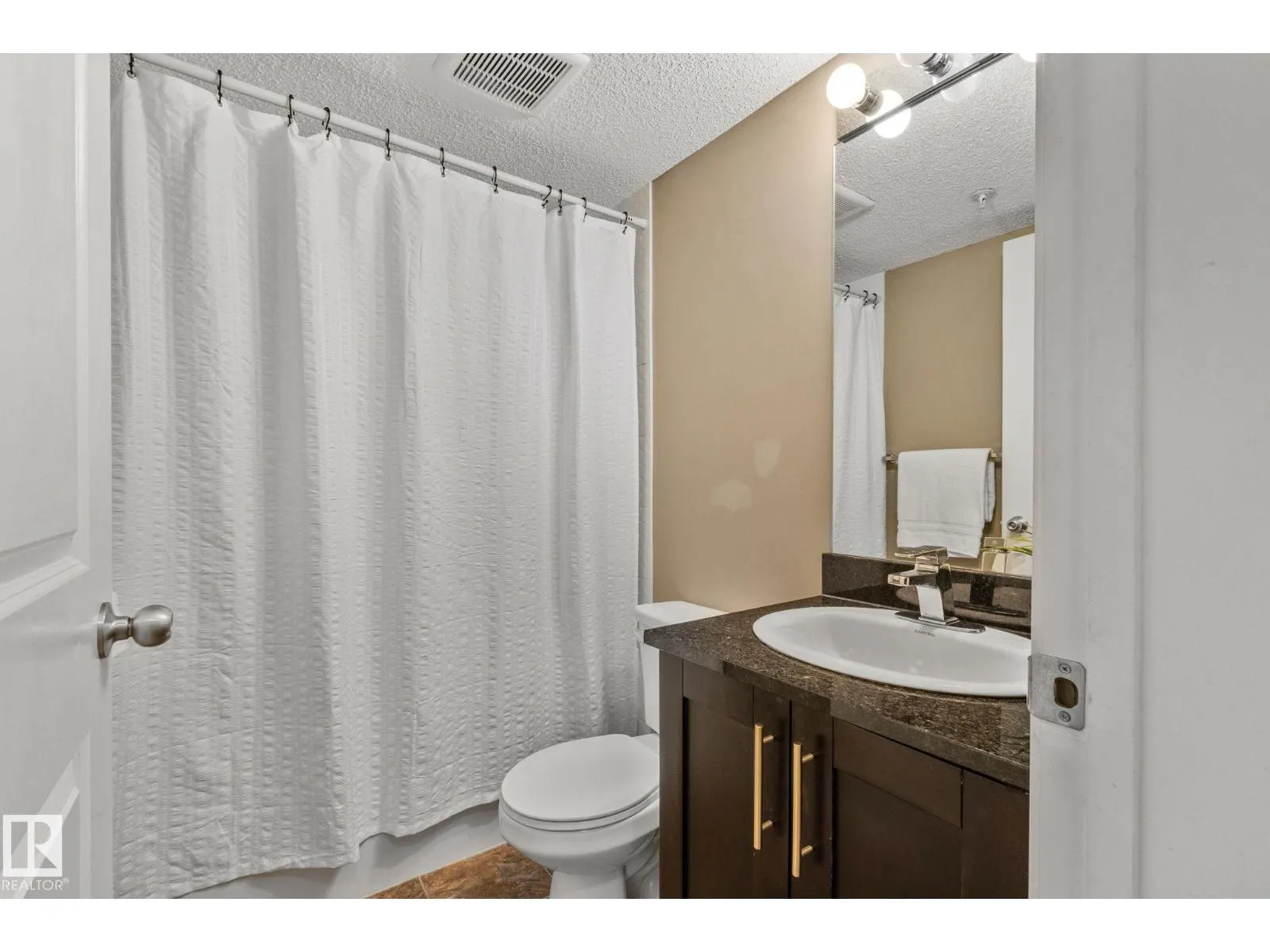 #210 5804 MULLEN PL NW
