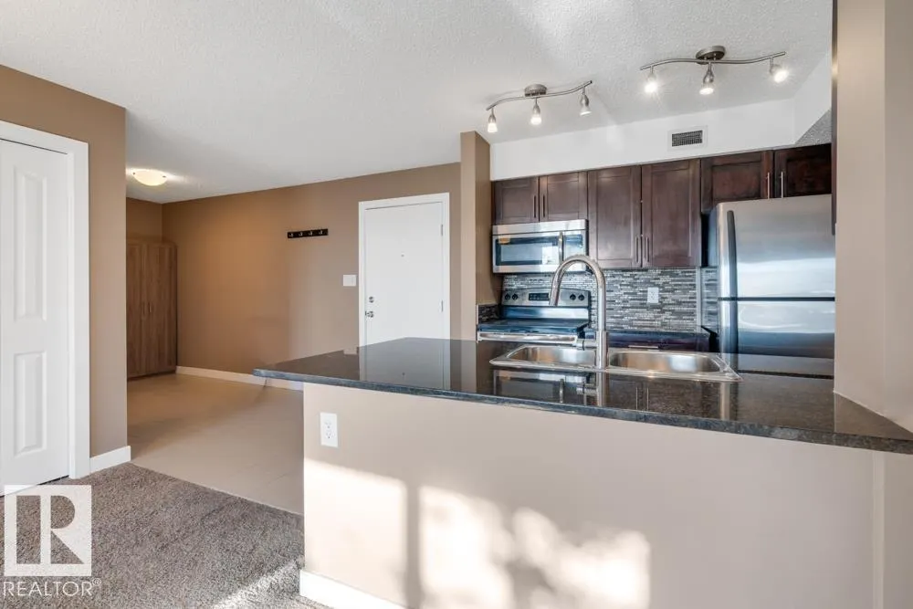 #403 11803 22 AV SW