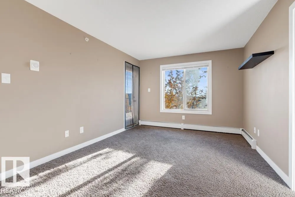 #403 11803 22 AV SW