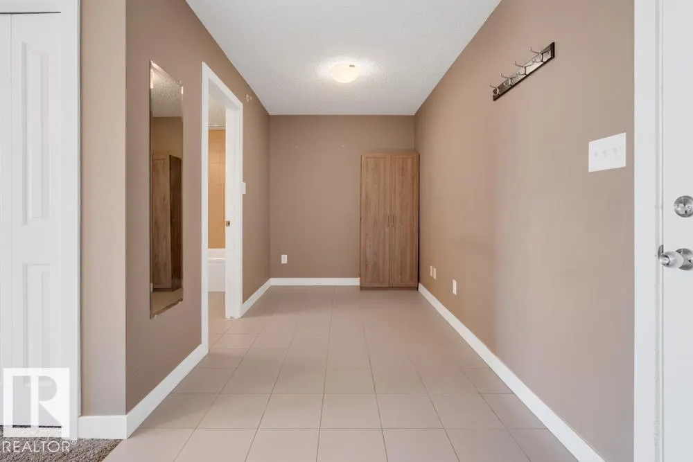 #403 11803 22 AV SW