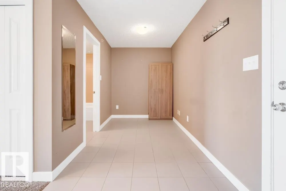 #403 11803 22 AV SW