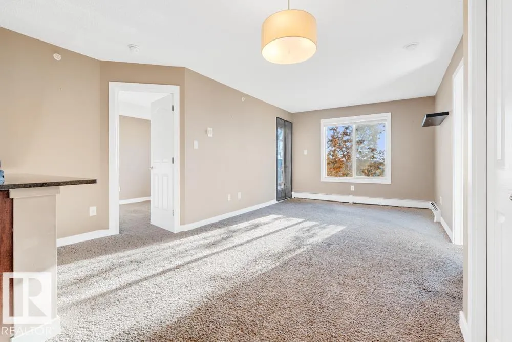 #403 11803 22 AV SW