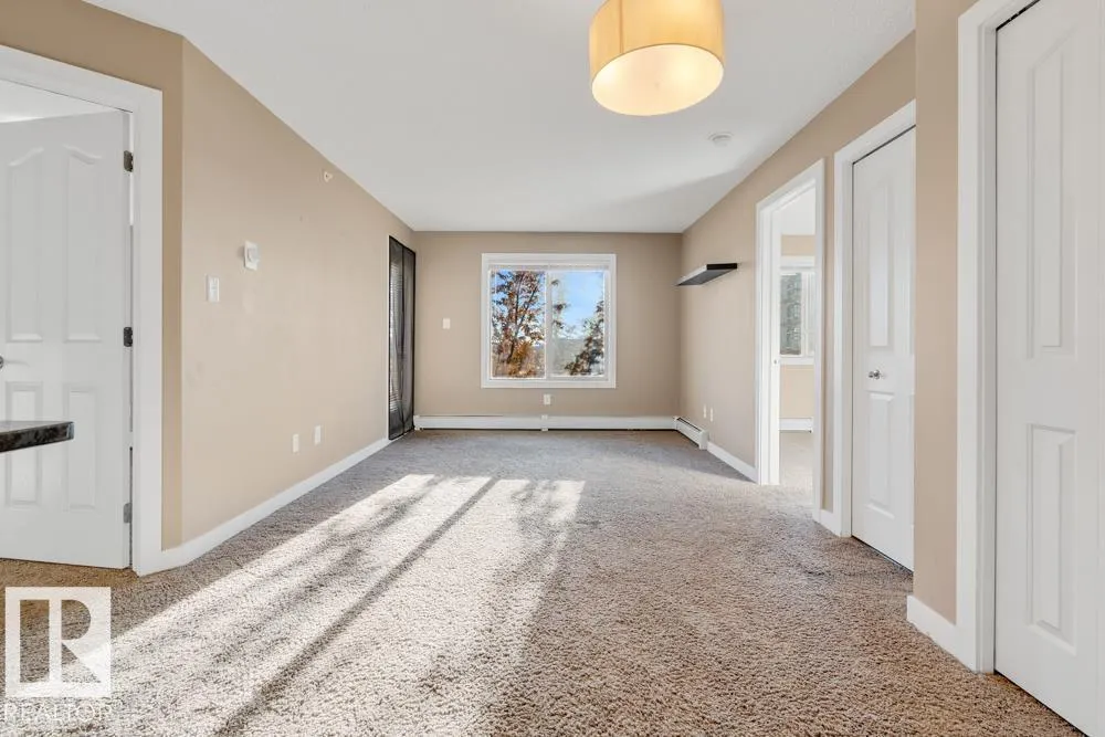 #403 11803 22 AV SW