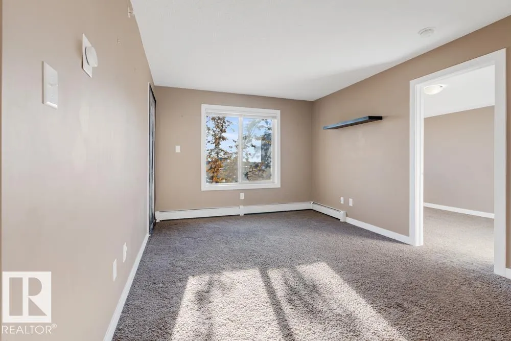 #403 11803 22 AV SW