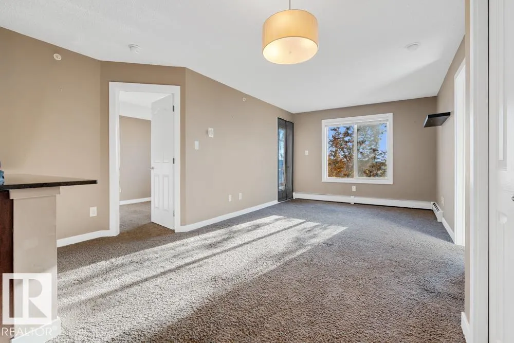 #403 11803 22 AV SW