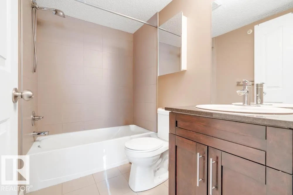 #403 11803 22 AV SW
