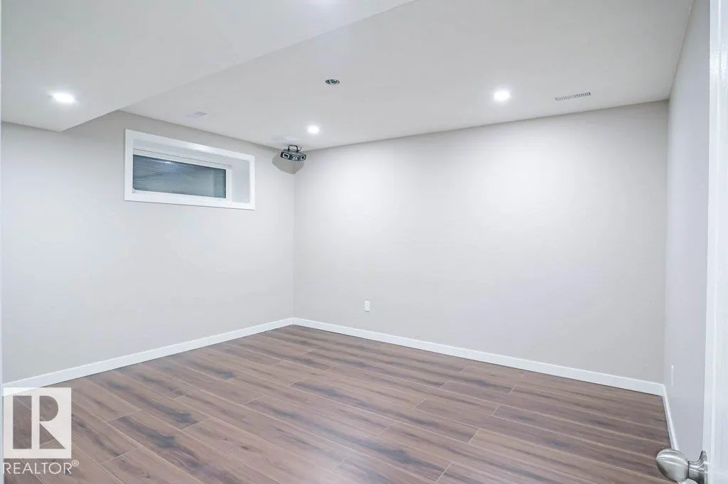 7913 ERASMUS CR NW