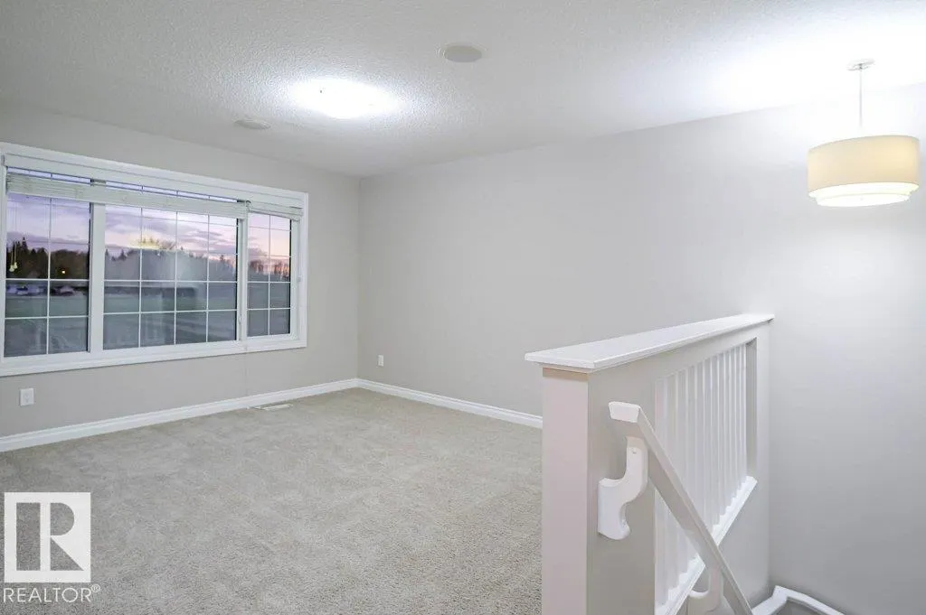 7913 ERASMUS CR NW