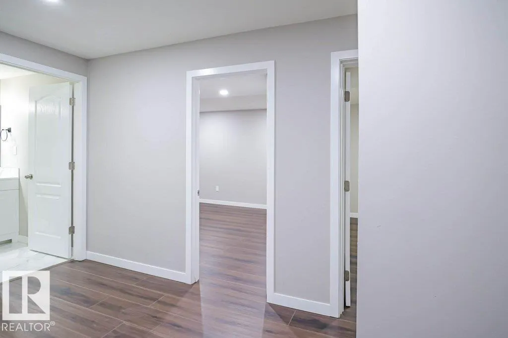 7913 ERASMUS CR NW