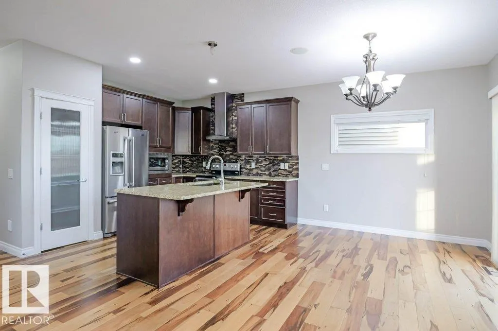 7913 ERASMUS CR NW