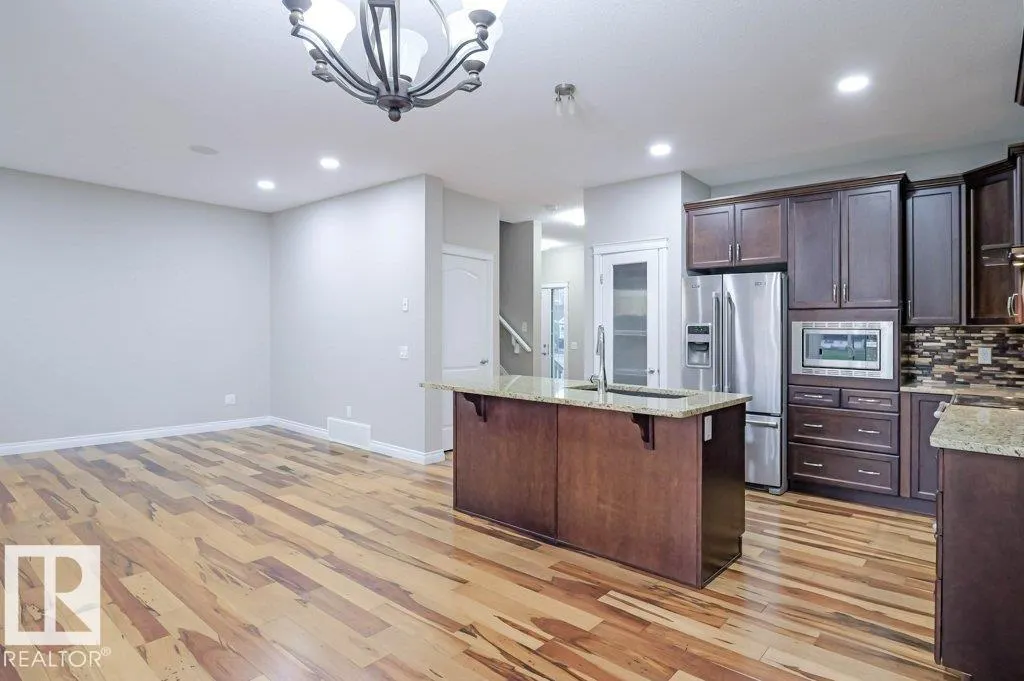 7913 ERASMUS CR NW
