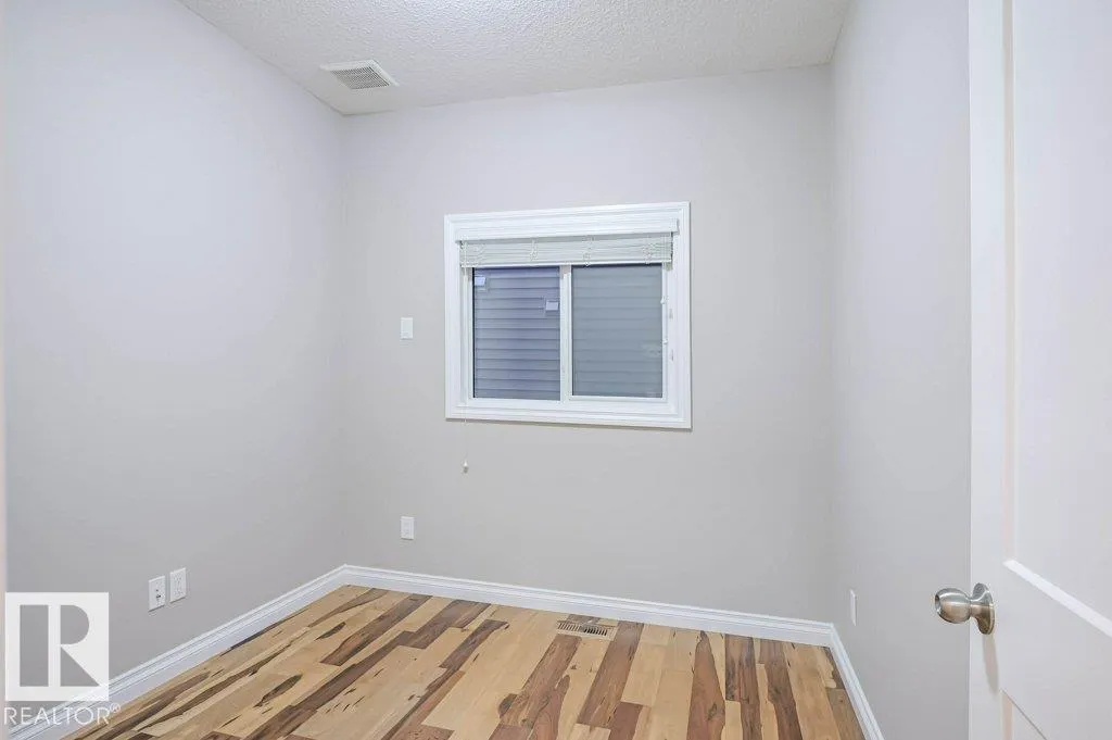 7913 ERASMUS CR NW