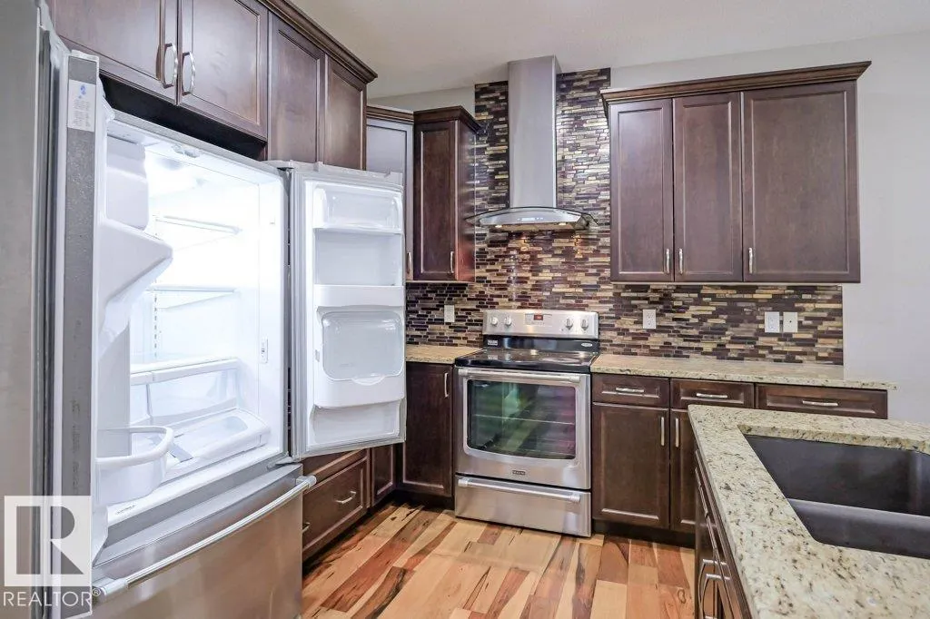 7913 ERASMUS CR NW