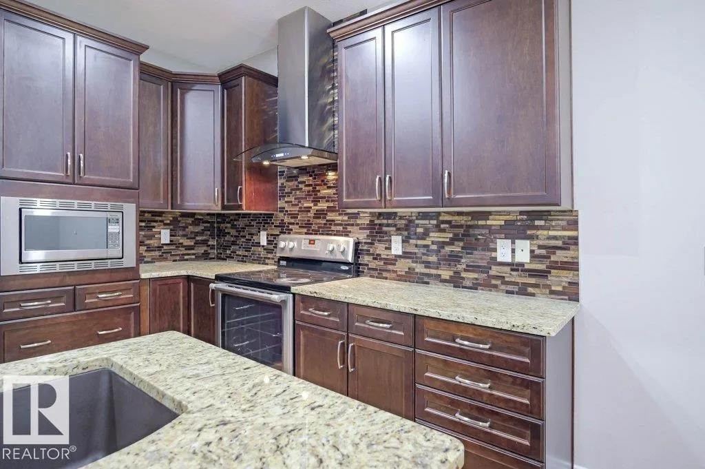 7913 ERASMUS CR NW