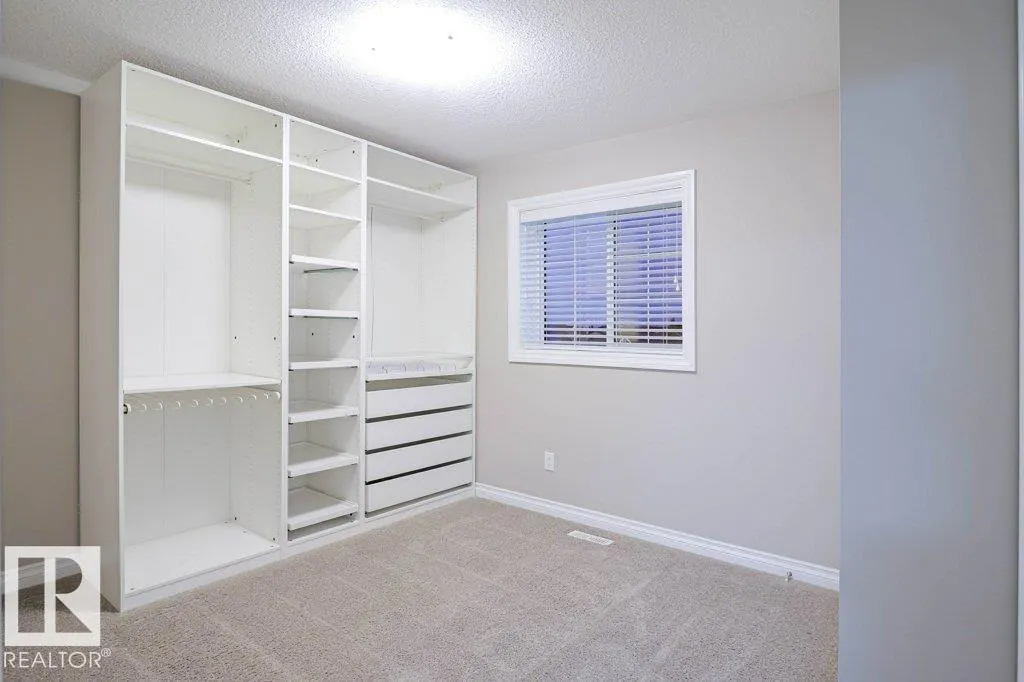 7913 ERASMUS CR NW