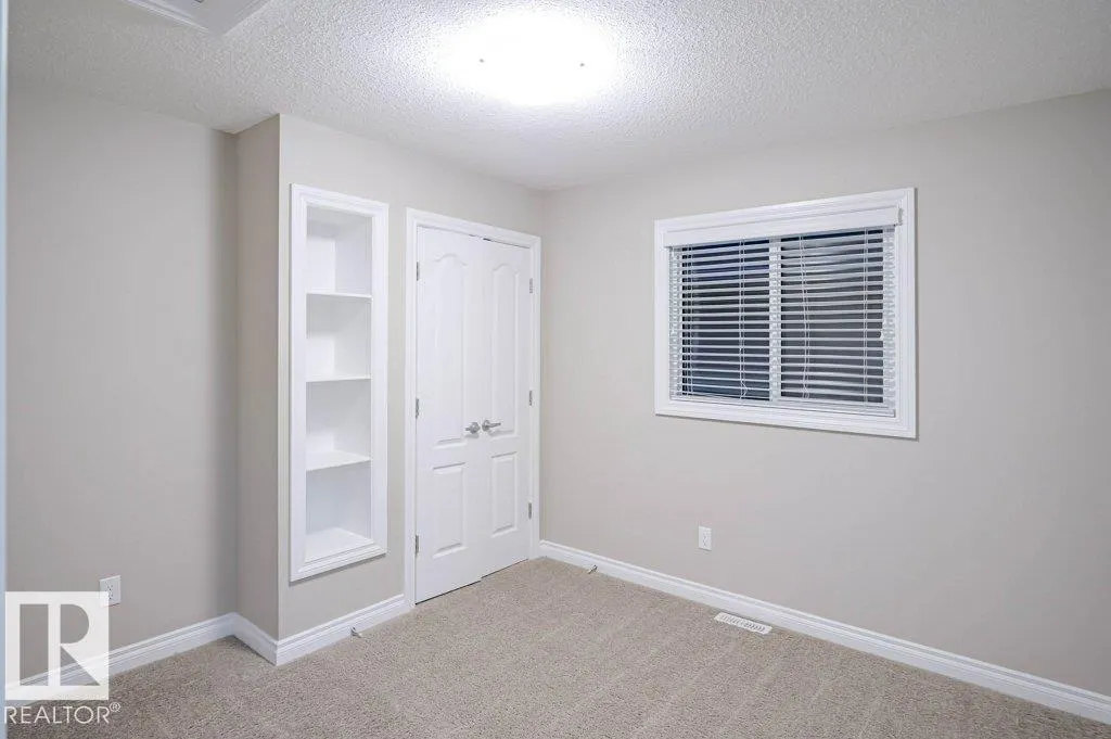 7913 ERASMUS CR NW