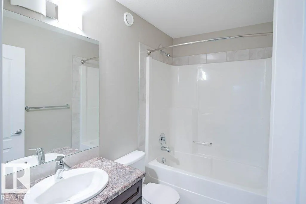 7913 ERASMUS CR NW
