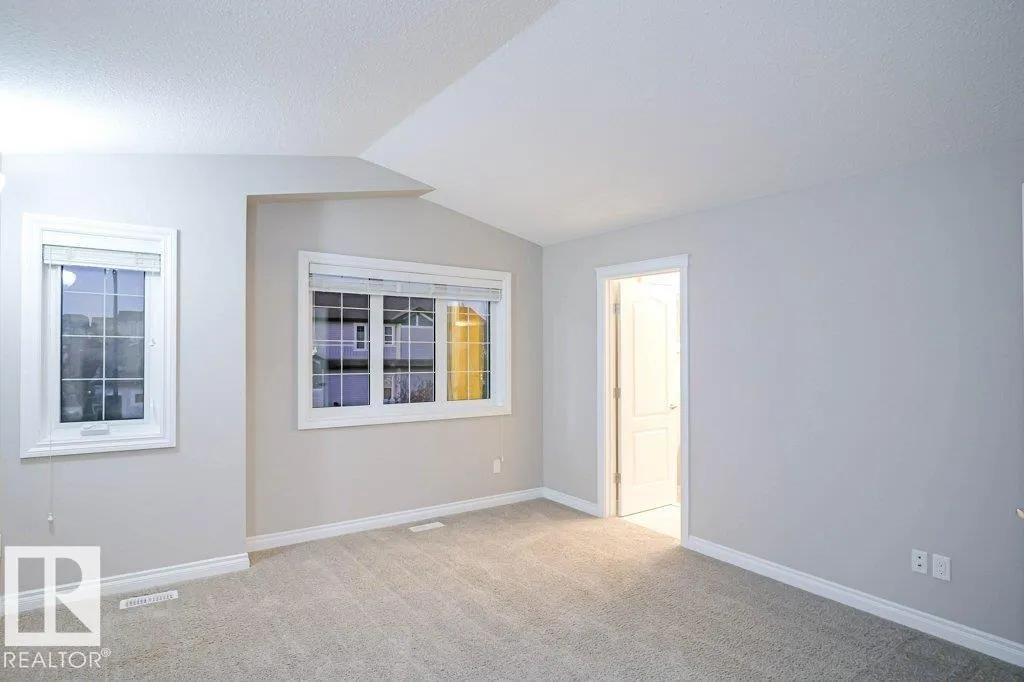 7913 ERASMUS CR NW