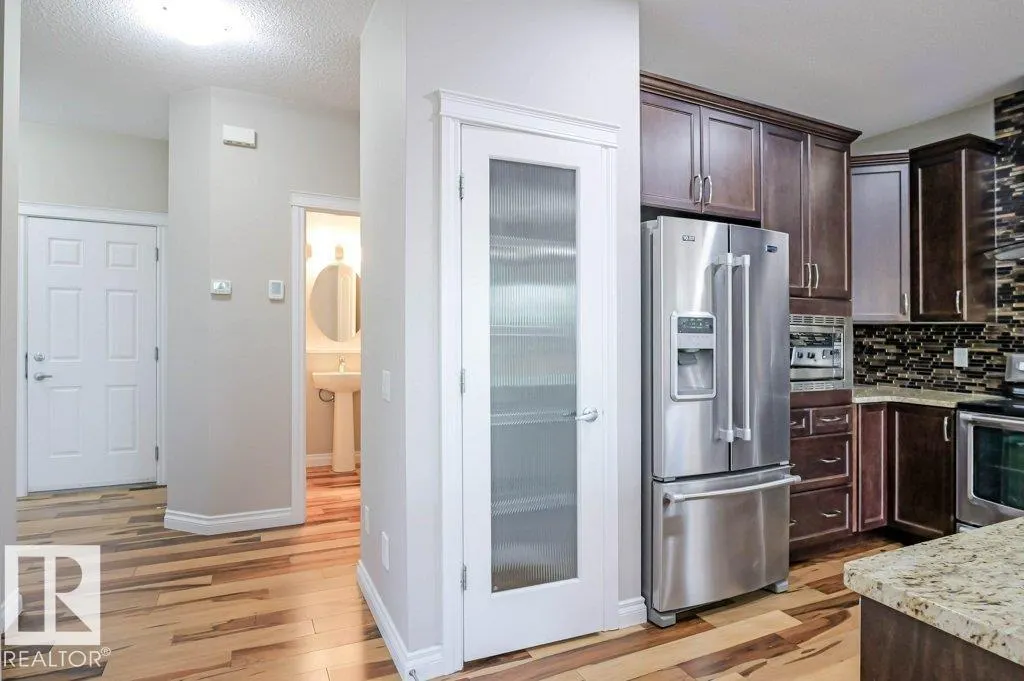 7913 ERASMUS CR NW