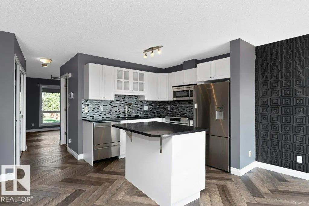 #214 10105 95 ST NW
