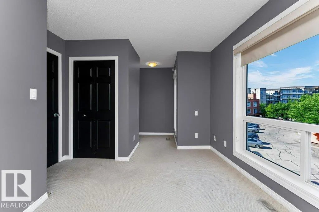 #214 10105 95 ST NW