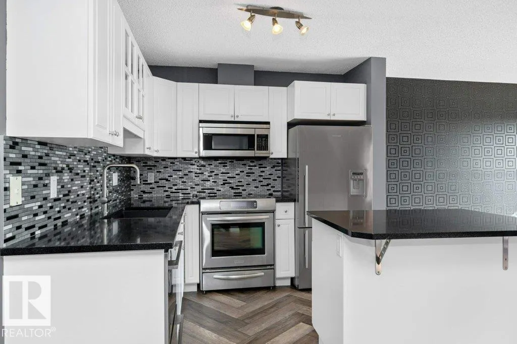 #214 10105 95 ST NW