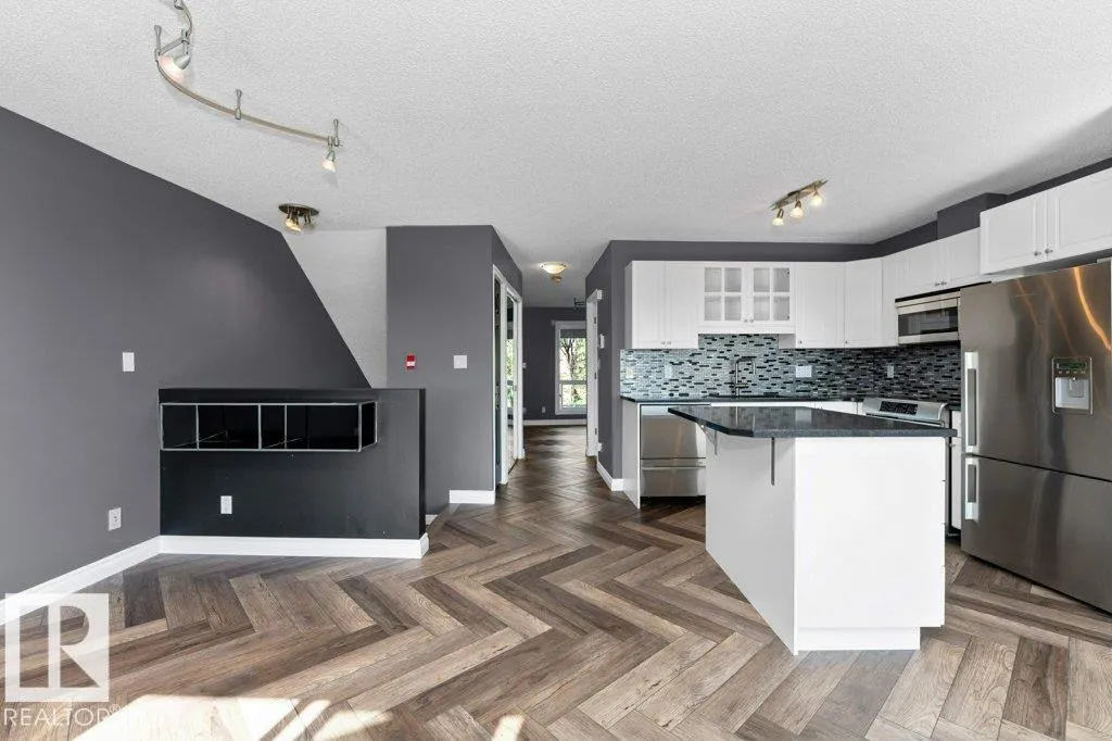 #214 10105 95 ST NW