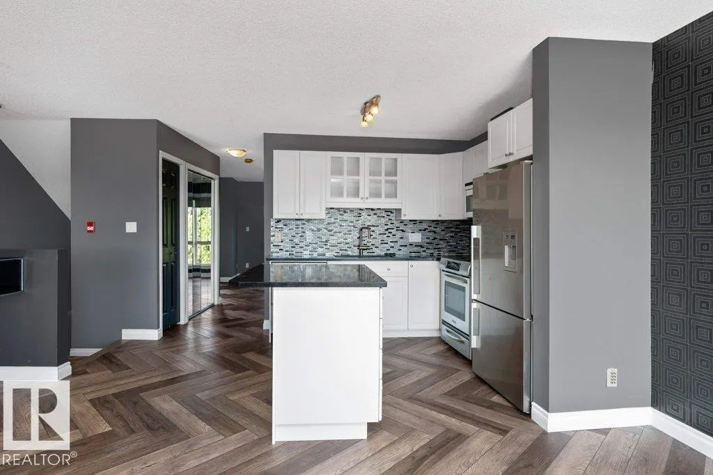 #214 10105 95 ST NW