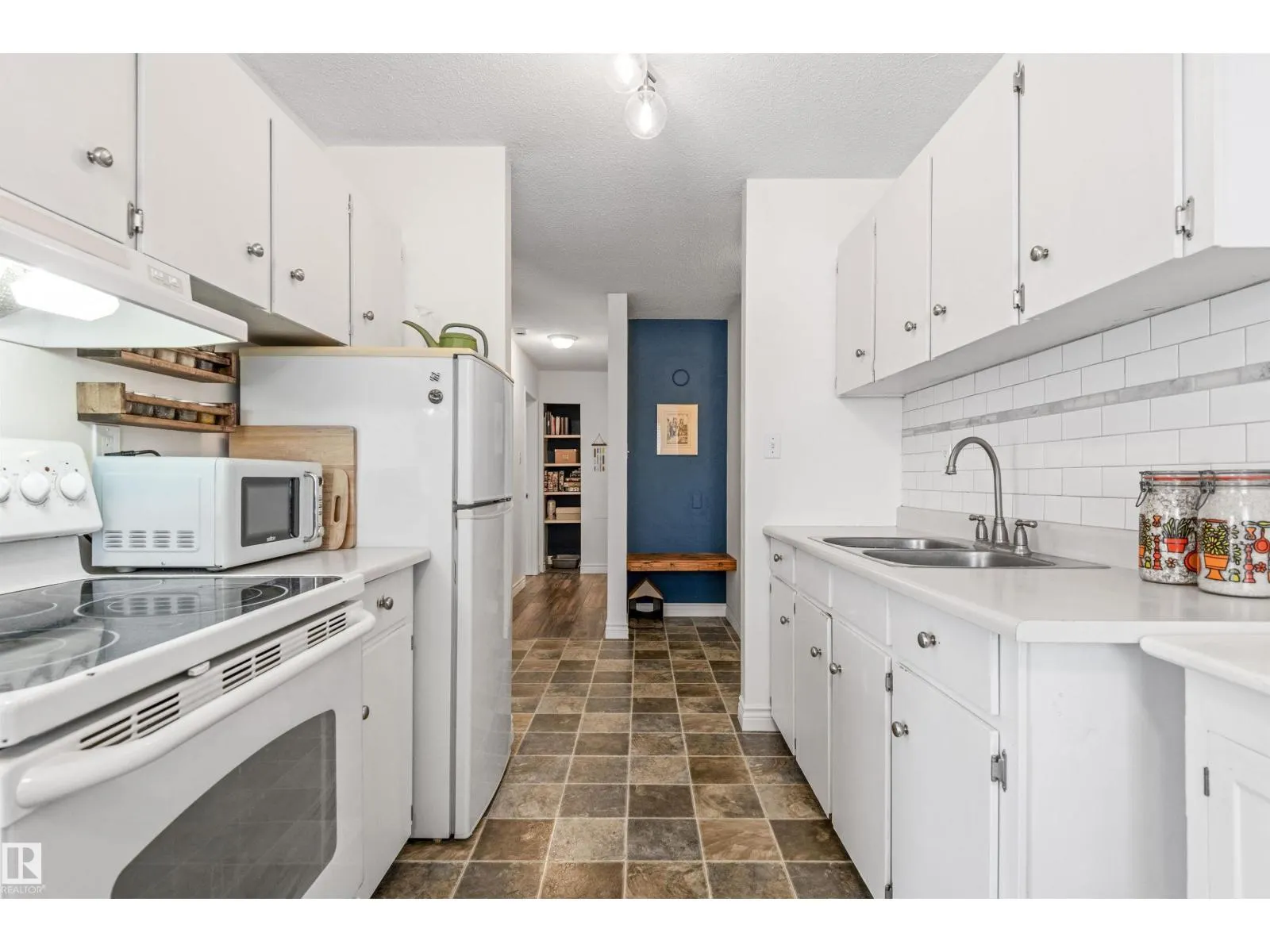 #402 10725 111 ST NW