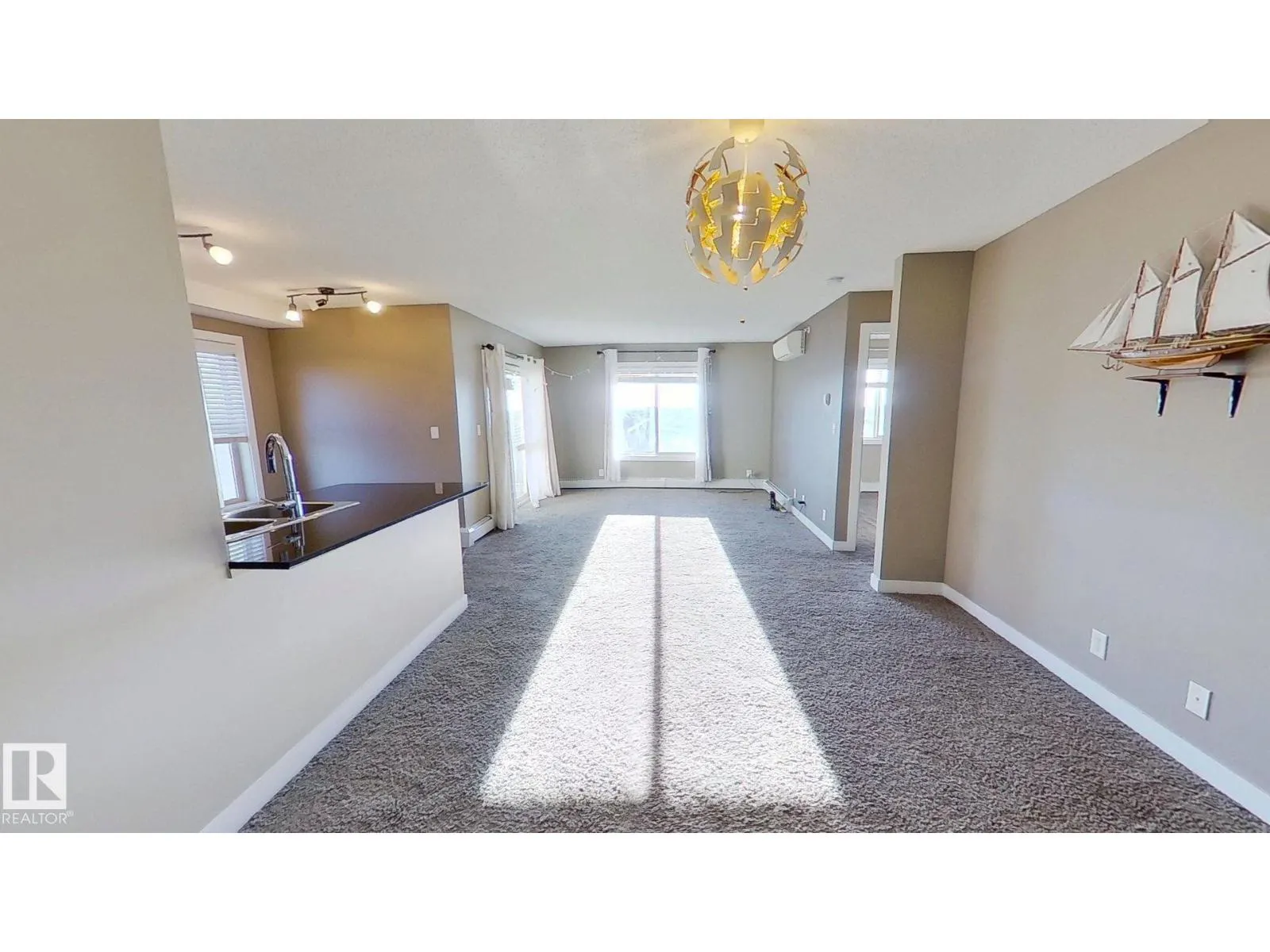 #402 11804 22 AV SW