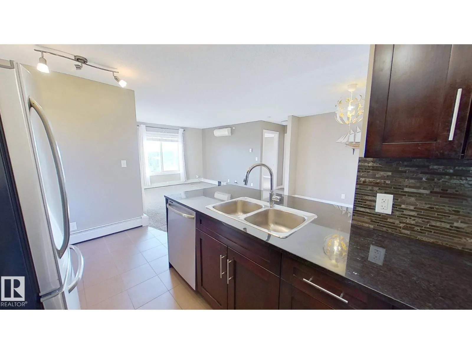 #402 11804 22 AV SW
