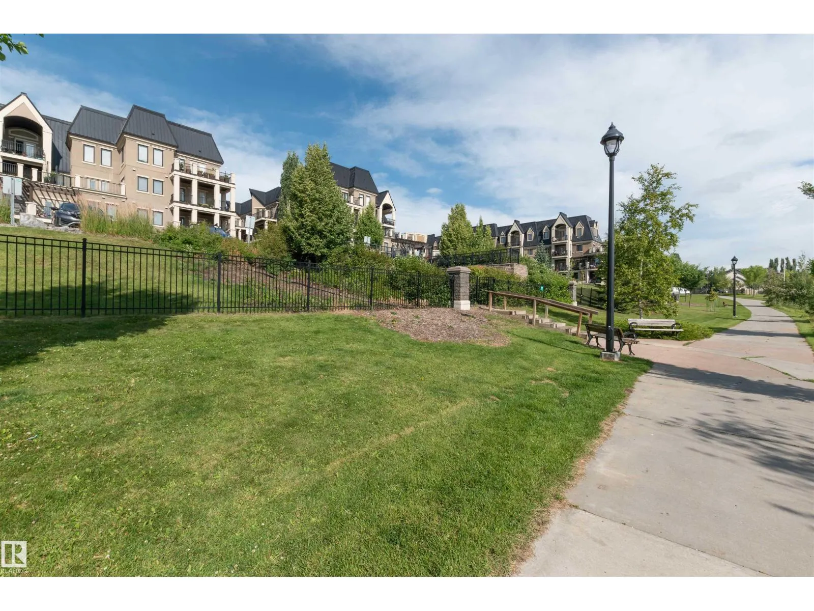 #140 6079 MAYNARD WY NW
