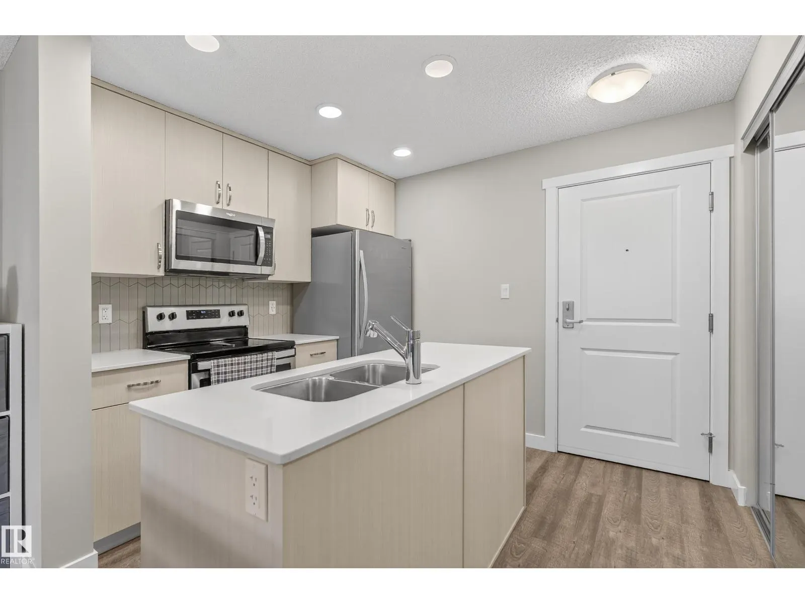 #316 1506 TAMARACK BV NW
