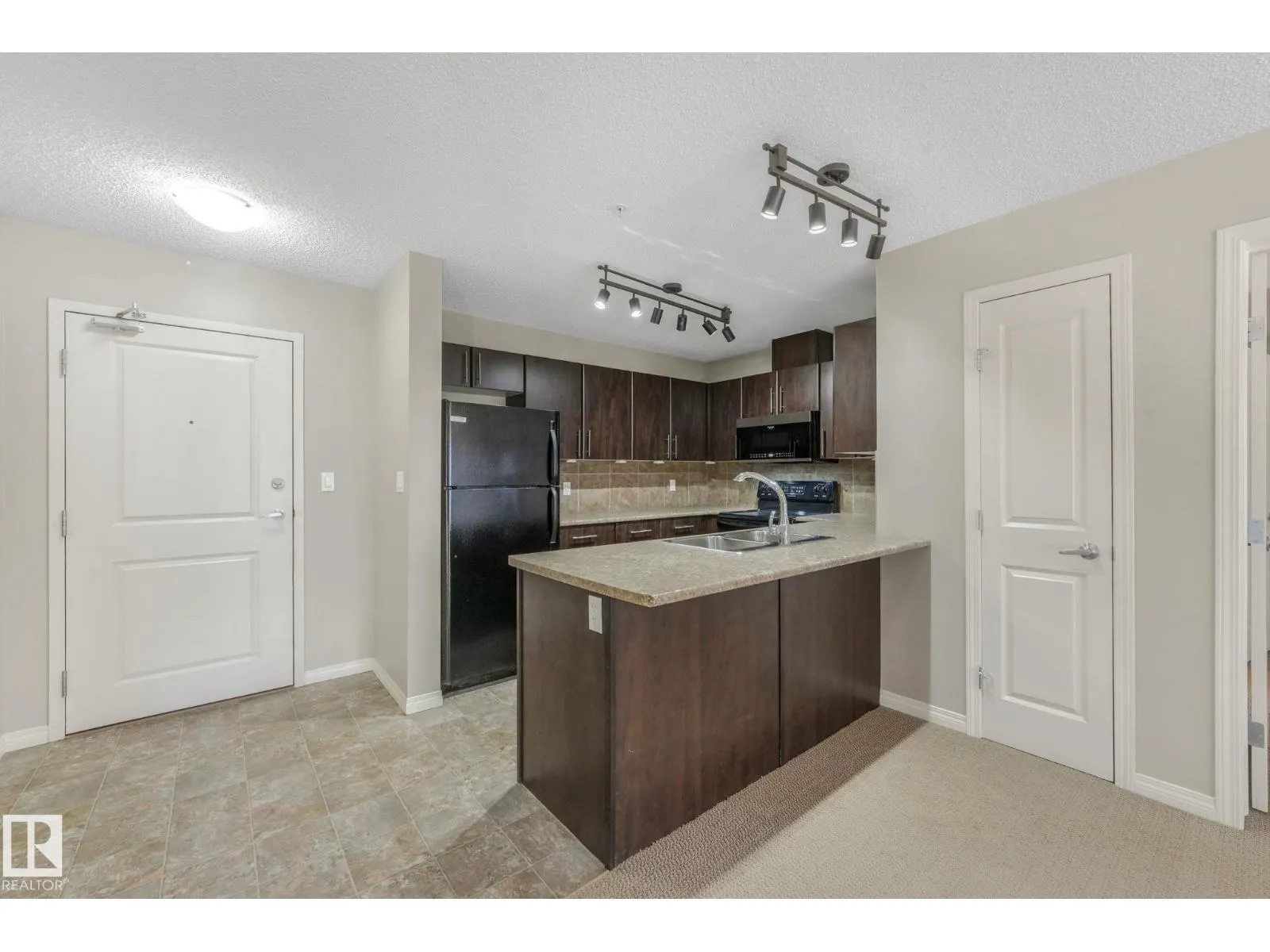 #210 103 AMBLESIDE DR SW