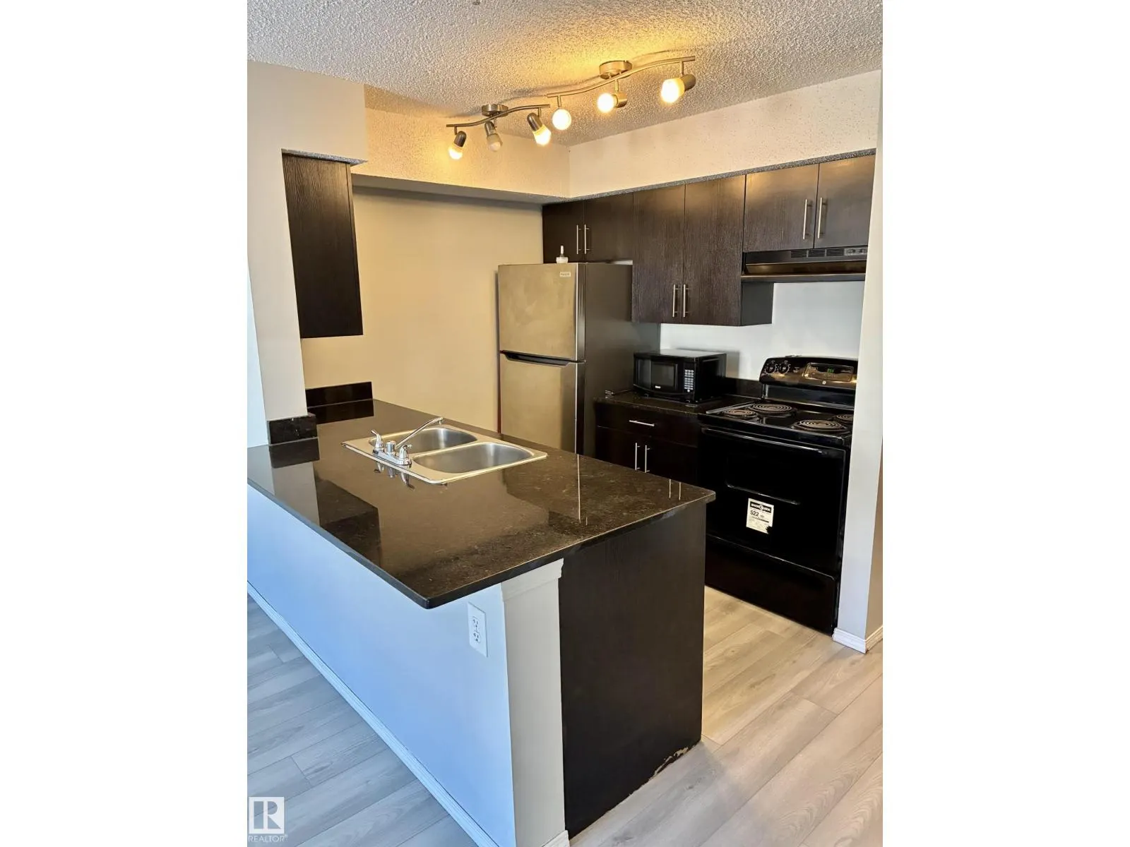 #307 1080 MCCONACHIE BV NW