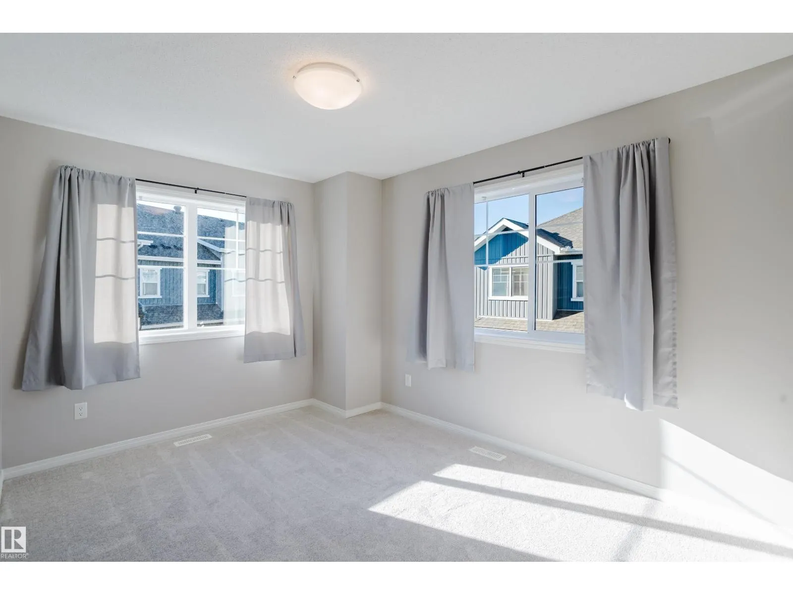 #47 7385 EDGEMONT WY NW NW