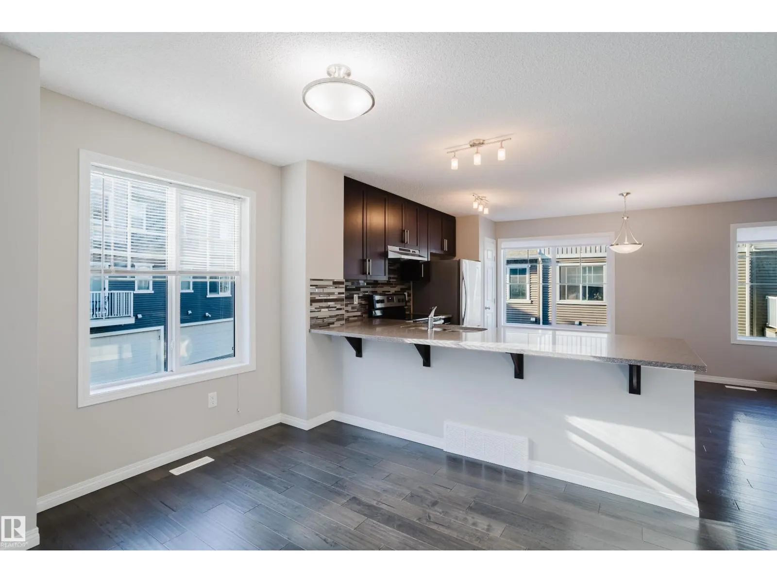 #47 7385 EDGEMONT WY NW NW