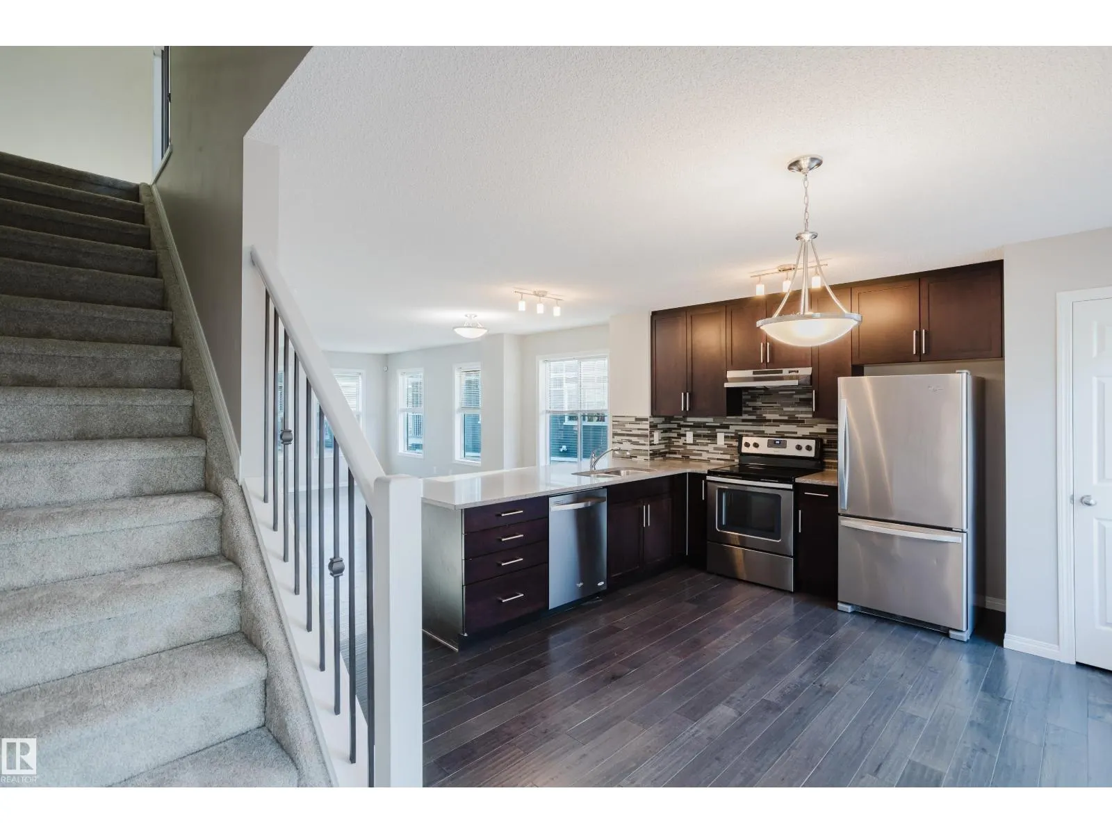 #47 7385 EDGEMONT WY NW NW